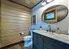 Main level half bath in entry hallway