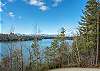 Enjoy the mountains & the water at this majestic lakefront home
