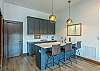Lower level kitchenette w/bar seating for 3