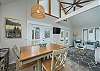 Dining and living areas w/patio access