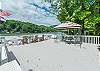 Spacious lower deck offers waterfront views & ample seating