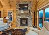 Living area w/gas logs fireplace & smart TV
