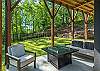 Lower level patio w/seating around the fire table