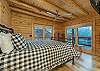 Main level bedroom w/queen & deck access