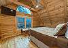 Upstairs bedroom w/king, smart TV & en suite bath