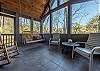 Screened-in porch w/swing & additional seating at the guest hous