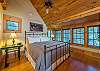 Main level open bedroom w/king & en suite bath