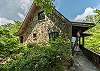 Charming stone walking path leading to the main house