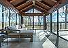 Enclosed sunroom offers gorgeous mountain views