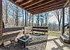 Outdoor fire pit area beneath the deck