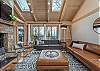 Main level living area w/natural gas fireplace & 4k Smart TV