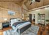 Main level bedroom w/California king bed & en suite bath