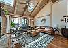 Sleek main level living area offers beautiful mountain views
