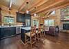 Open living, kitchen, and dining areas