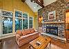 Luxe & inviting living area w/gas fireplace & TV