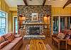Stacked stone gas fireplace in the living room