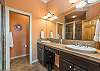 En suite bath w/walk-in shower & double vanity