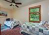 Upper level bedroom w/2 twin beds.