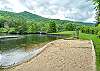 Small beach area & dock at Lake Logan