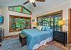 Main level bedroom w/king bed & bay window
