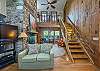 Staircase leading to upstairs level
