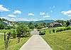 Easy to navigate paved driveway leading to the home
