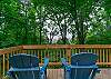Relax in the Adirondack chairs with a glass of wine