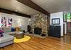 Lower level den area w/cozy fireplace