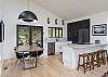 Sleek kitchen & dining areas w/breakfast bar seating for 4