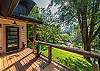 Gorgeous front porch view shows off the idyllic countryside