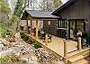 The stunning & spacious back deck is the perfect place to
