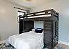Main level bedroom w/full bed, twin bunk & desk station