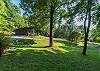 Take time to enjoy the16 private acres of forest at the home