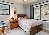 Main level bedroom w/full bed & desk station