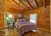Upper level bedroom w/queen bed & en suite bath