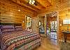 Main level bedroom w/queen bed, en suite bath,