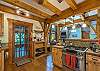 Kitchen w/gas range stove & stainless appliances