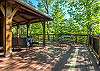 Outdoor dining table w/ seating for 4 on the wraparound porch