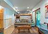 Lower level den w/ 3 sets of bunk beds.