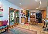 Lower level kitchenette w/ doors out to patio.