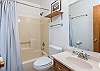 Upper level full hall bath w/ shower/tub combo.