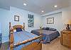 Bedroom on lower level w/ queen & twin bed.