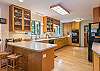 Fully equipped kitchen w/ island seating for 2.