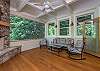 Apt screen porch w/ wood fireplace.