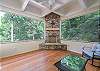 Apt screen porch w/ wood fireplace.