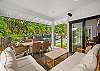 view of dinning room, kitchen, backyard of the pool area