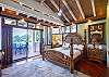 Upstairs bedroom with lani and bathroom