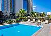 Take a refreshing swim in the Four Paddle pool, surrounded by palm trees and Waikiki’s skyline—perfect for cooling off after a morning beach walk.