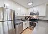 A well-equipped kitchen with coffee maker and modern essentials makes mornings effortless before heading out to explore Honolulu.