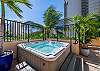 Soak away the day’s adventures in this private hot tub oasis, framed by tropical greenery and Honolulu’s warm island air.